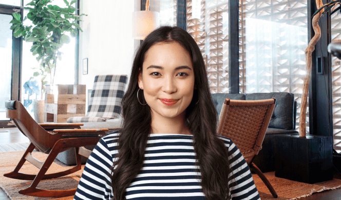 Person with long hair in casual office